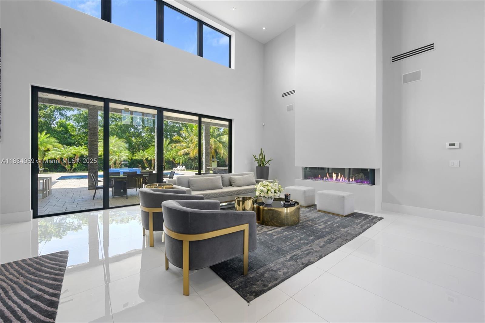 11350 Northwest 8th Street Plantation, FL 33325 - Photo 8 of 68 a living room with furniture and a large window