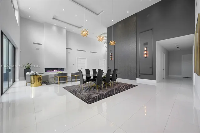 a kitchen with stainless steel appliances a refrigerator and a stove top oven