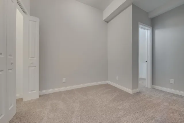 a view of storage and utility room with washer and dryer