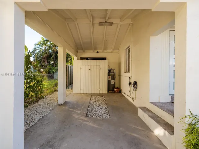 a view of a back yard of the house