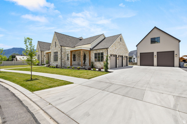 478 South Maple Lakes Drive Mapleton, UT 84664 - Photo 45 of 51 Stone facade residence with a multi-car attached garage and a detached multi-car garage structure
