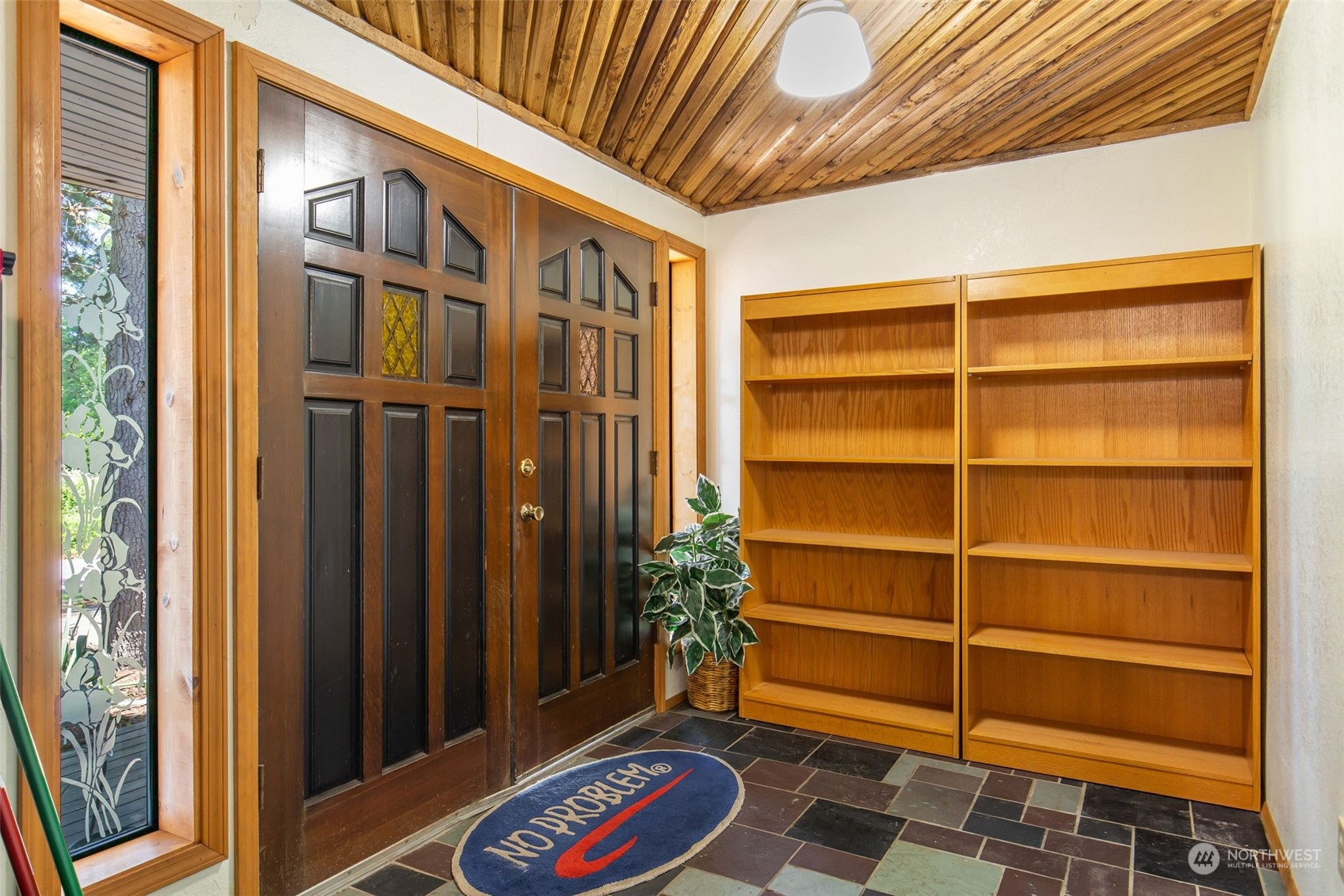 1497 Old Military Road Southeast Tenino, WA 98589 - Photo 2 of 39 a room with a bed and a window
