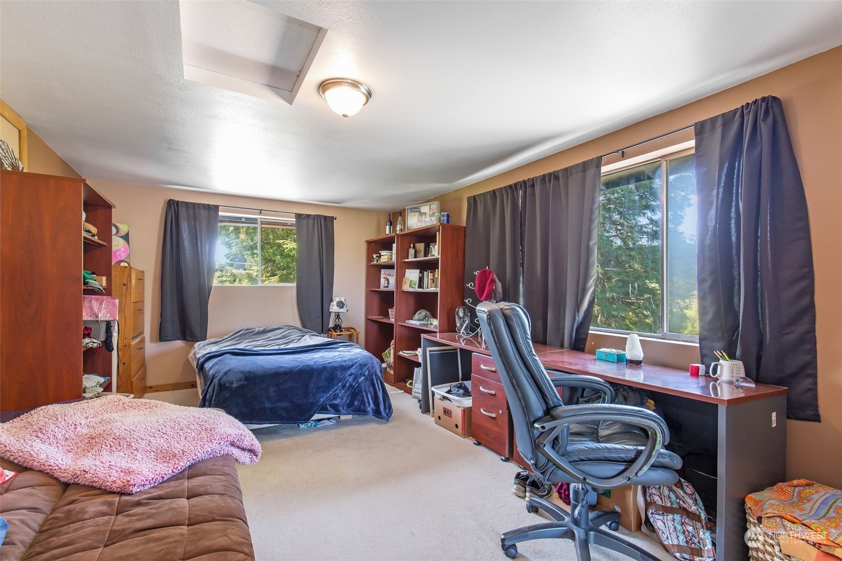 1497 Old Military Road Southeast Tenino, WA 98589 - Photo 21 of 39 a view of a livingroom with furniture and a window