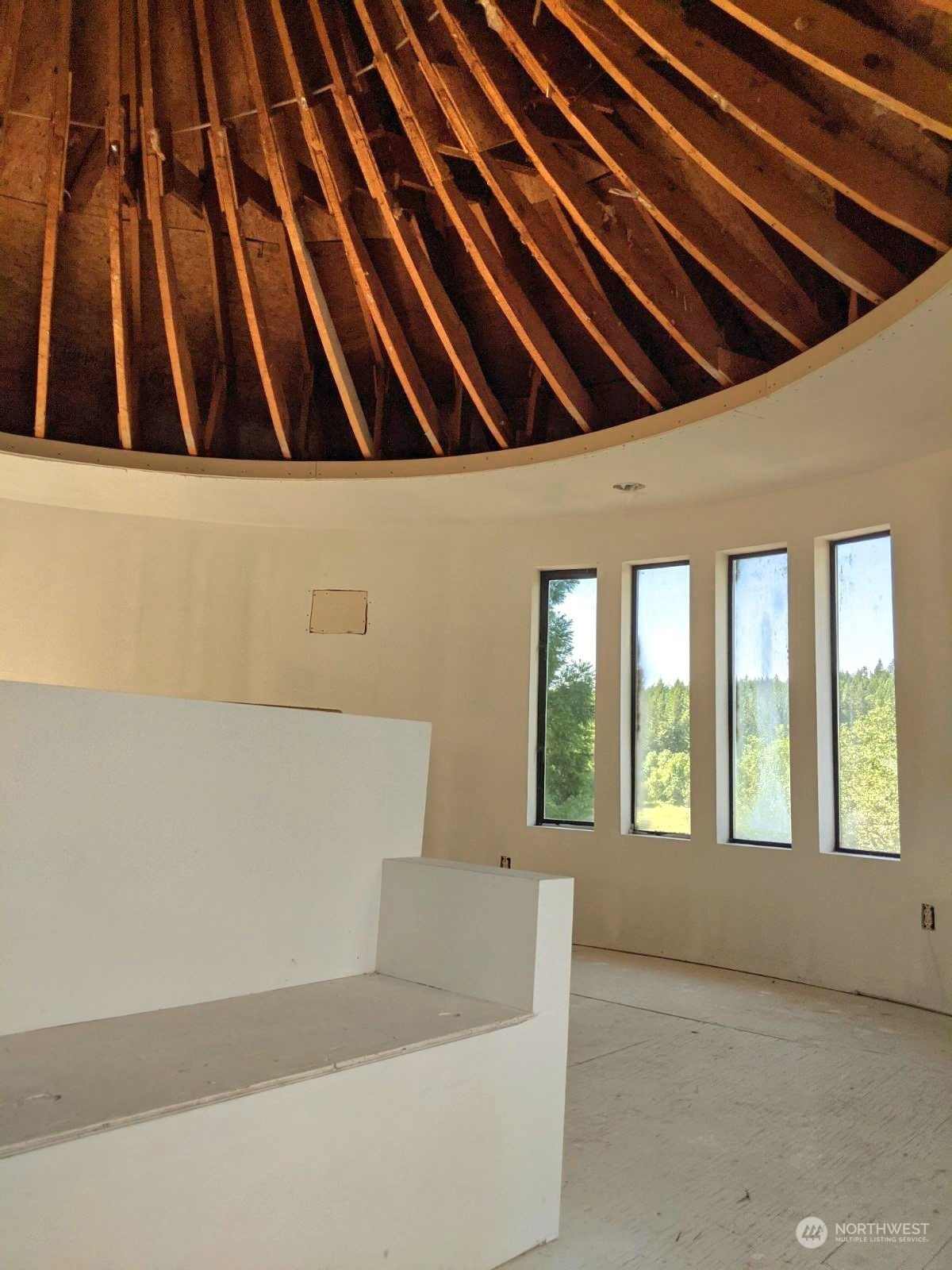 1497 Old Military Road Southeast Tenino, WA 98589 - Photo 22 of 39 a view of an empty room with windows