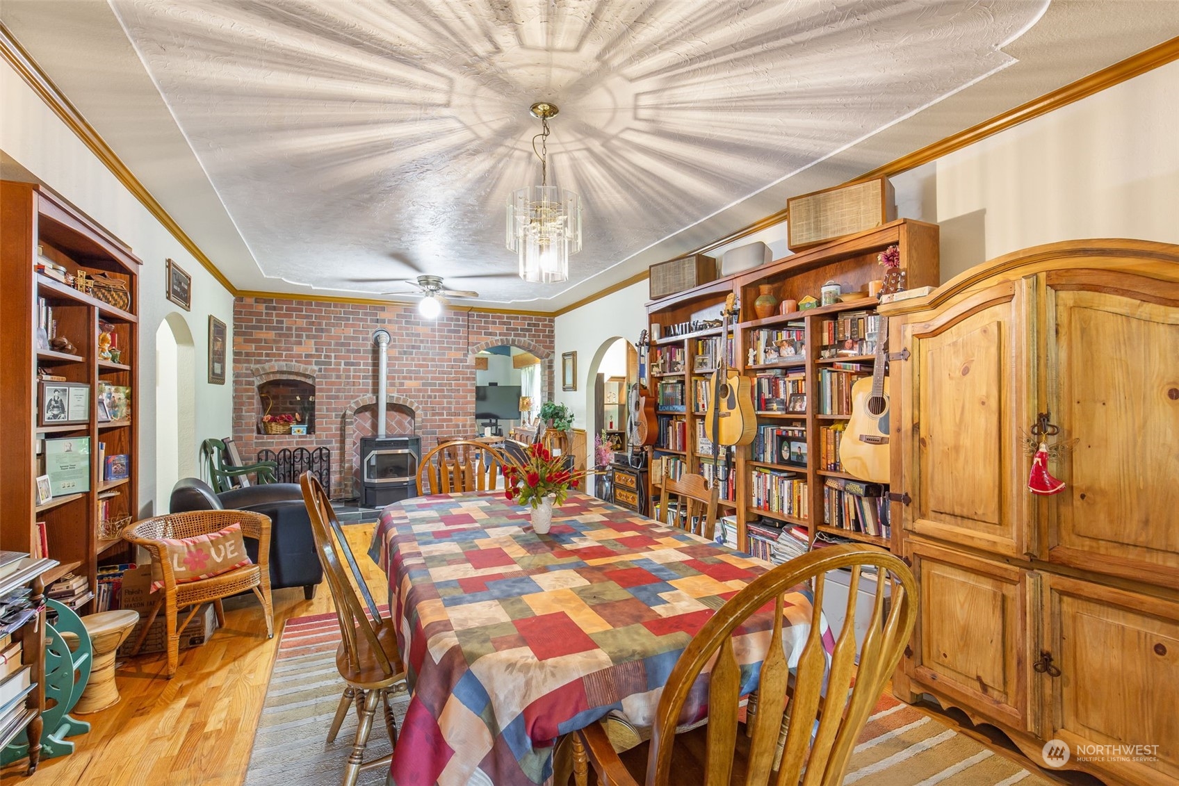 1497 Old Military Road Southeast Tenino, WA 98589 - Photo 5 of 39 a view of a dining room with furniture and chandelier