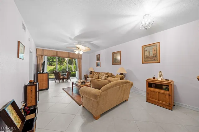 $725,000 | 871 Tanbark Drive, Unit 101, Naples, FL 34108