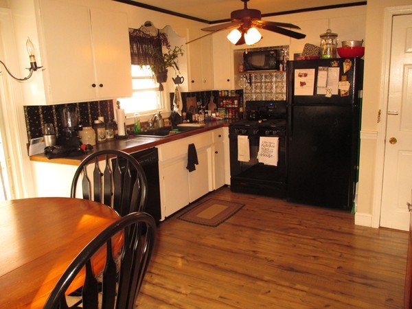 66 Charme Road Billerica, MA 01821 - Photo 4 of 22 a kitchen view with table and chairs