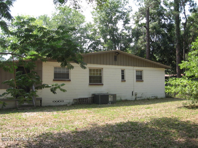 7189 Balboa Road Jacksonville, FL 32217 - Photo 13 of 13 a house with trees in the background