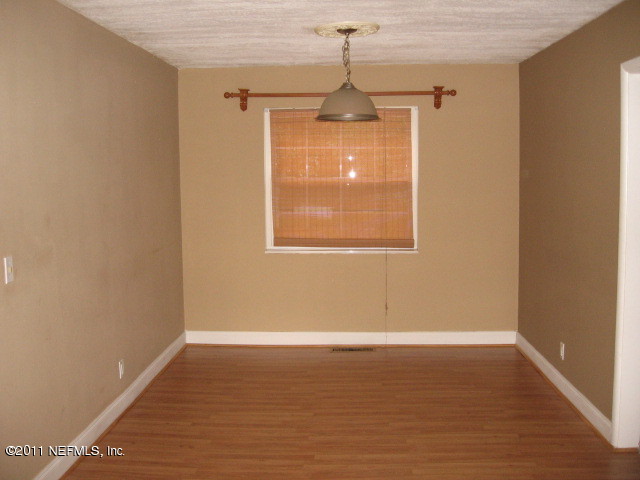 7189 Balboa Road Jacksonville, FL 32217 - Photo 3 of 13 a view of an empty room with a window