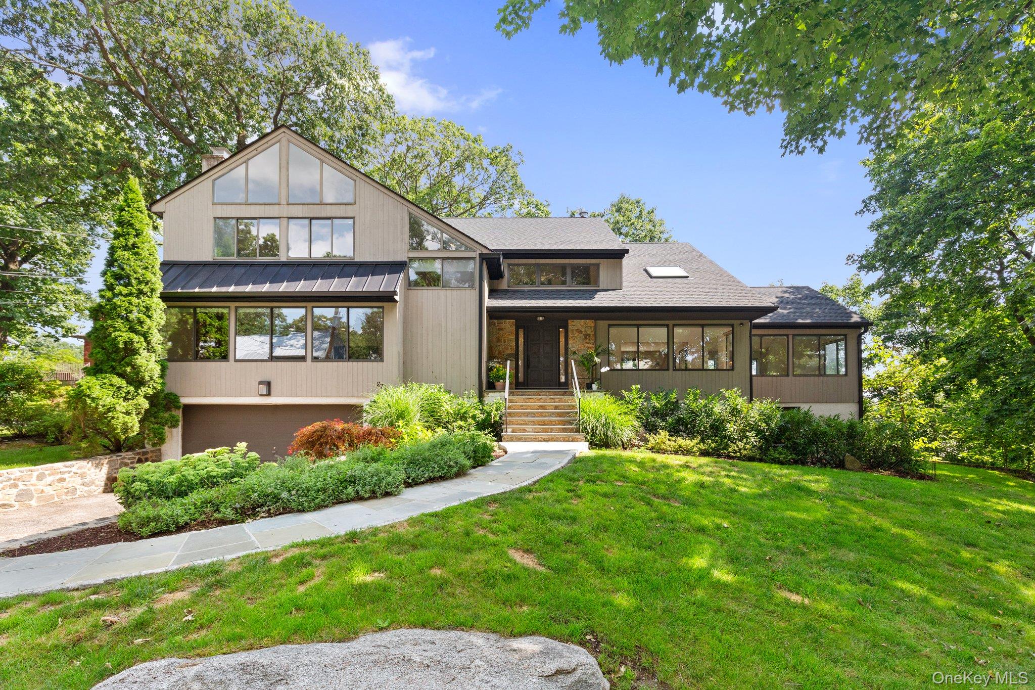 27 Stone Cabin Road New Rochelle, NY 10801 - Photo 3 of 24 View of front of property featuring a front yard