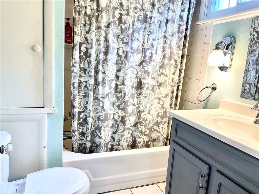 224 West Pearl Street Butler, PA 16001 - Photo 12 of 30 a bathroom with a granite countertop sink toilet and shower