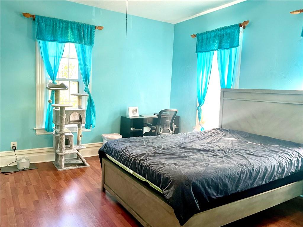 224 West Pearl Street Butler, PA 16001 - Photo 14 of 30 a bedroom with a bed and a window