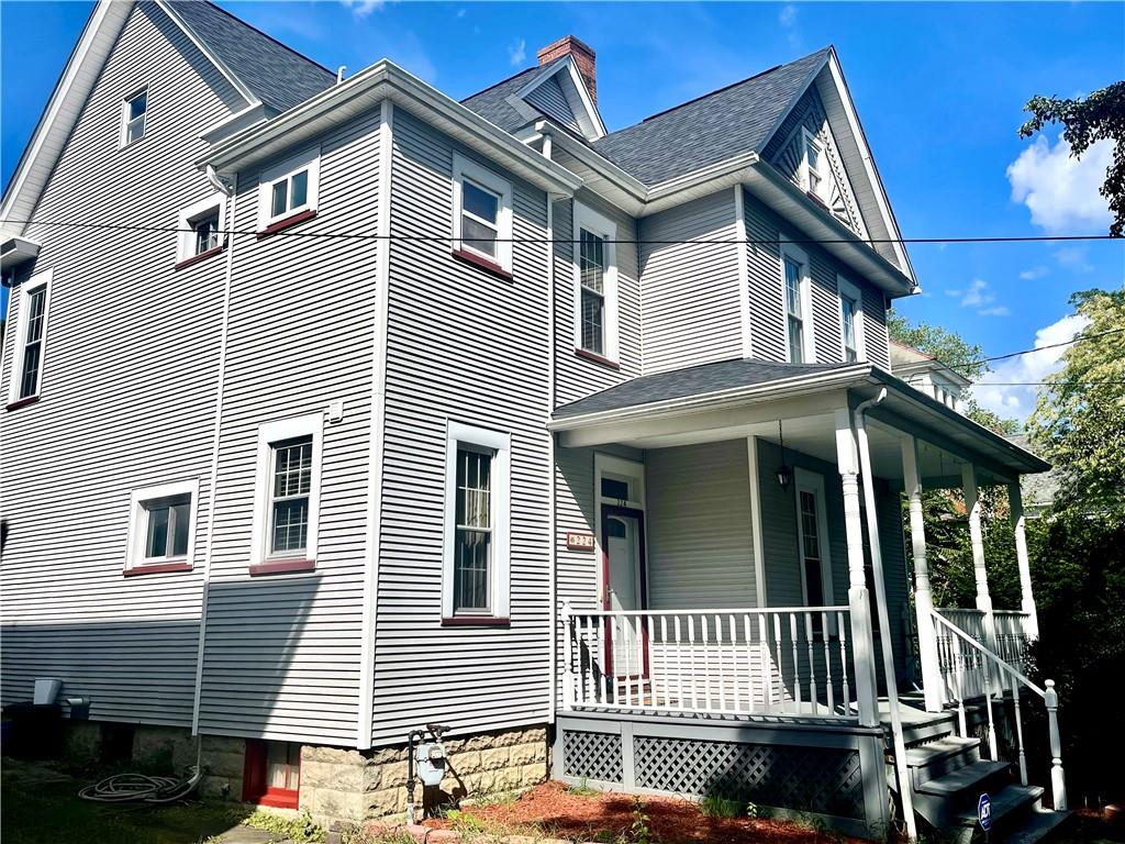 224 West Pearl Street Butler, PA 16001 - Photo 26 of 30 a view of a house with a small yard and wooden fence