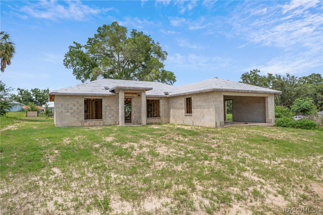 4525 East Rejoice Street Inverness, FL 34453 - Photo 2 of 32 front view of a house with a yard