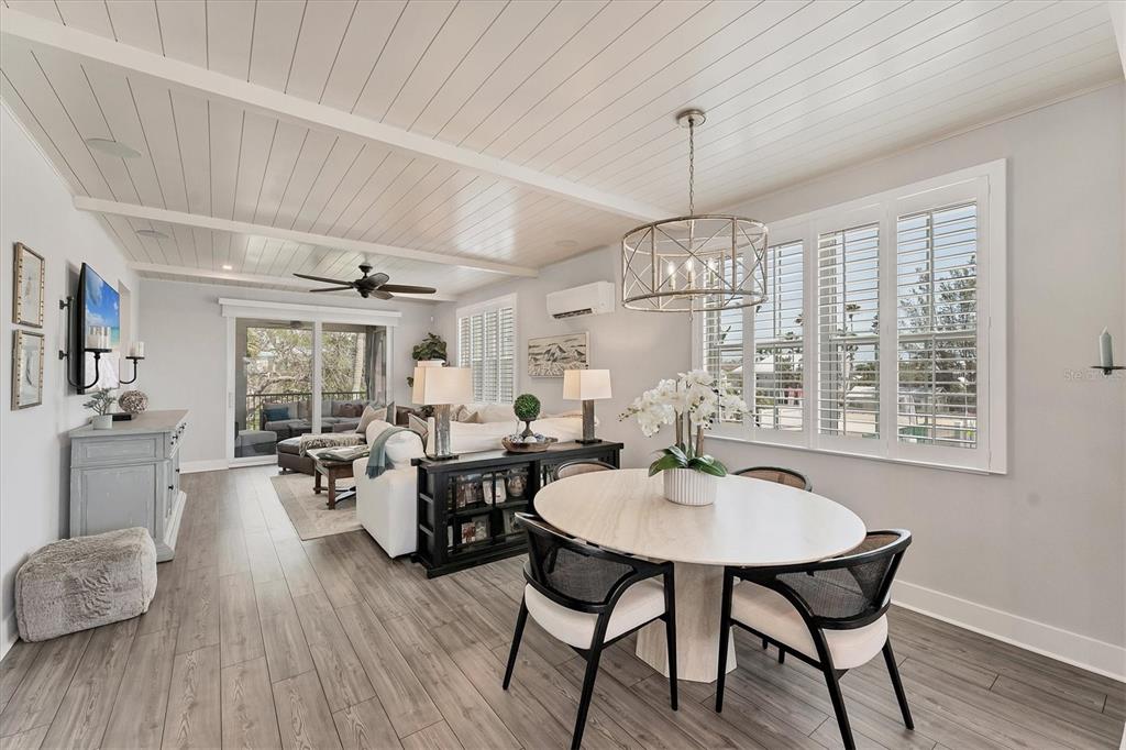 4357 Marina Vw Way Cortez, FL 34215 - Photo 11 of 59 a dining room with furniture window wooden floor