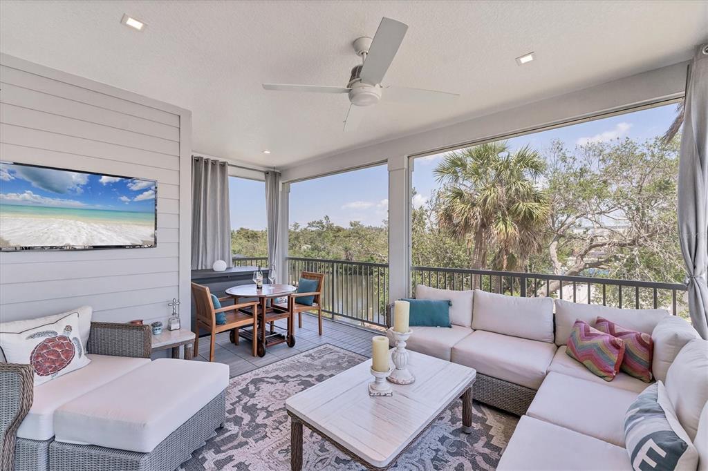 4357 Marina Vw Way Cortez, FL 34215 - Photo 13 of 59 a living room with furniture and a large window