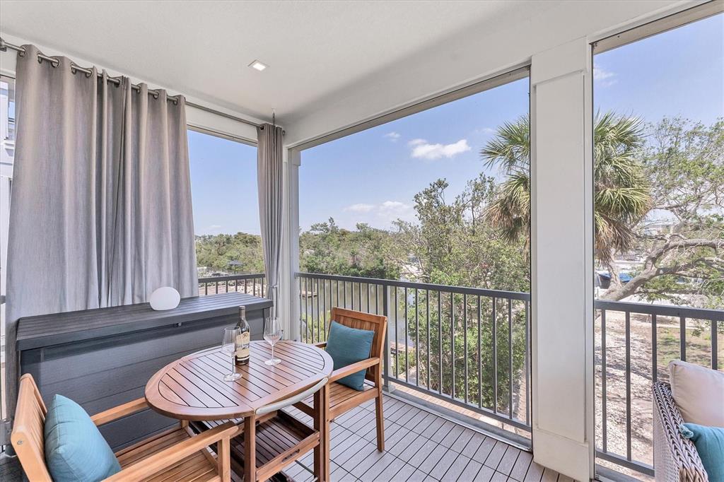 4357 Marina Vw Way Cortez, FL 34215 - Photo 15 of 59 a view of a dining room with furniture window and outside view