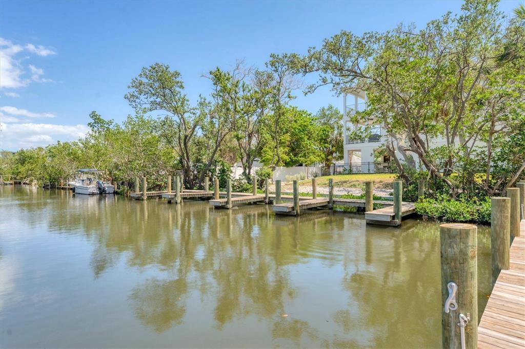 4357 Marina Vw Way Cortez, FL 34215 - Photo 7 of 59 a view of a lake with houses