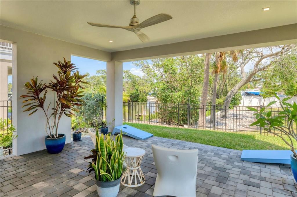 4357 Marina Vw Way Cortez, FL 34215 - Photo 8 of 59 a living room with garden view and a floor to ceiling window