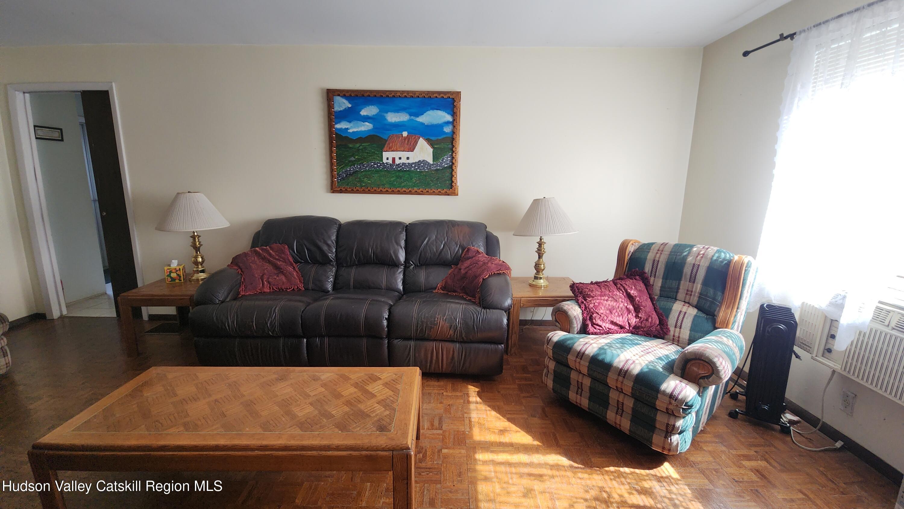 17 Clay Hill Road Durham, NY 12423 - Photo 5 of 15 a living room with furniture and a couch