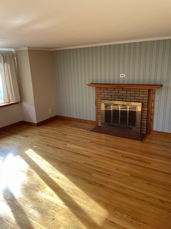 100 Francis Wyman Road Burlington, MA 01803 - Photo 6 of 17 a view of an empty room with wooden floor and a window