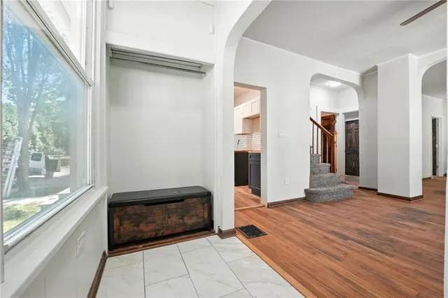 a view of an empty room and window