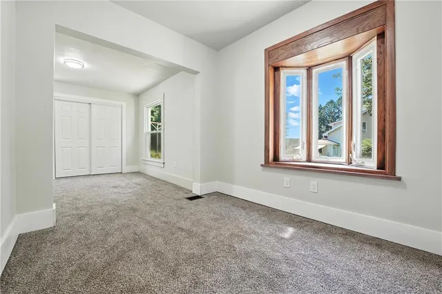 an empty room with windows