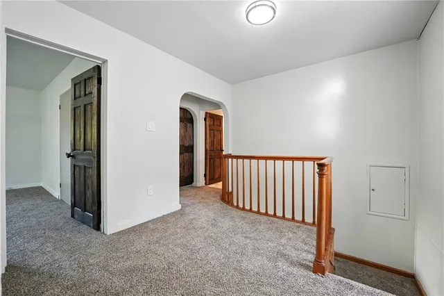 a view of a livingroom with a hallway