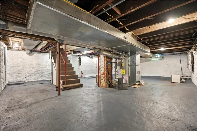 a view of an empty room with stairs