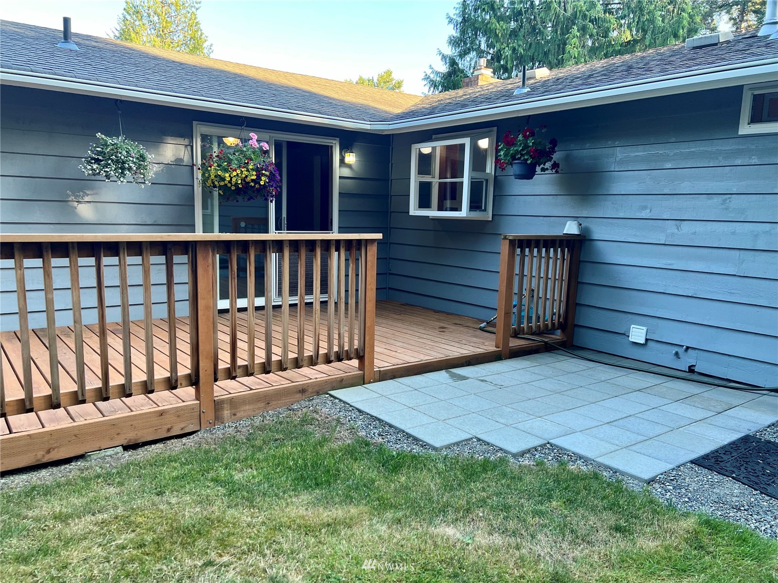 7407 Vandermark Road East Bonney Lake, WA 98391 - Photo 27 of 30 a view of a house with a yard and wooden fence
