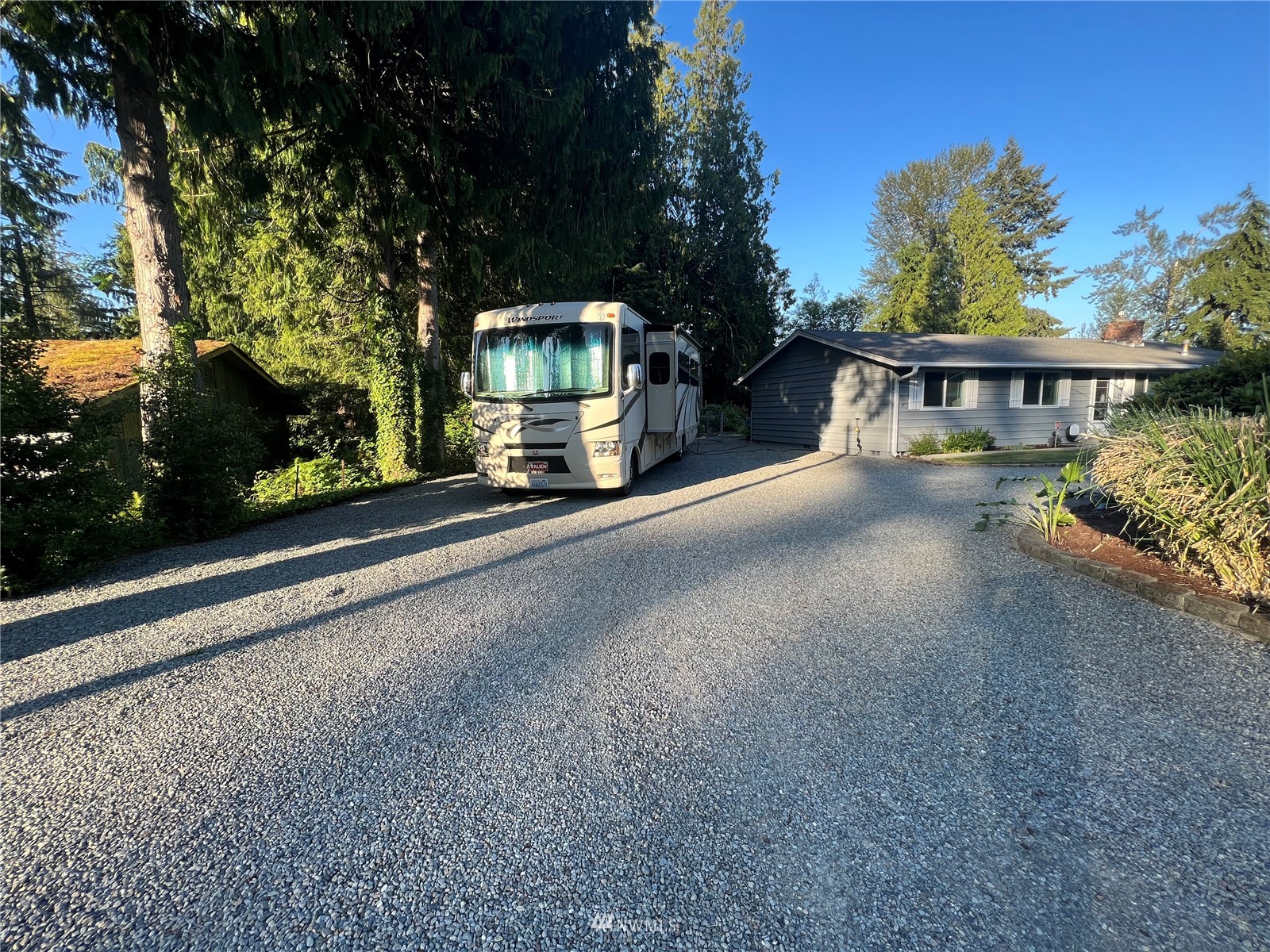 7407 Vandermark Road East Bonney Lake, WA 98391 - Photo 29 of 30 a view of a house with a street