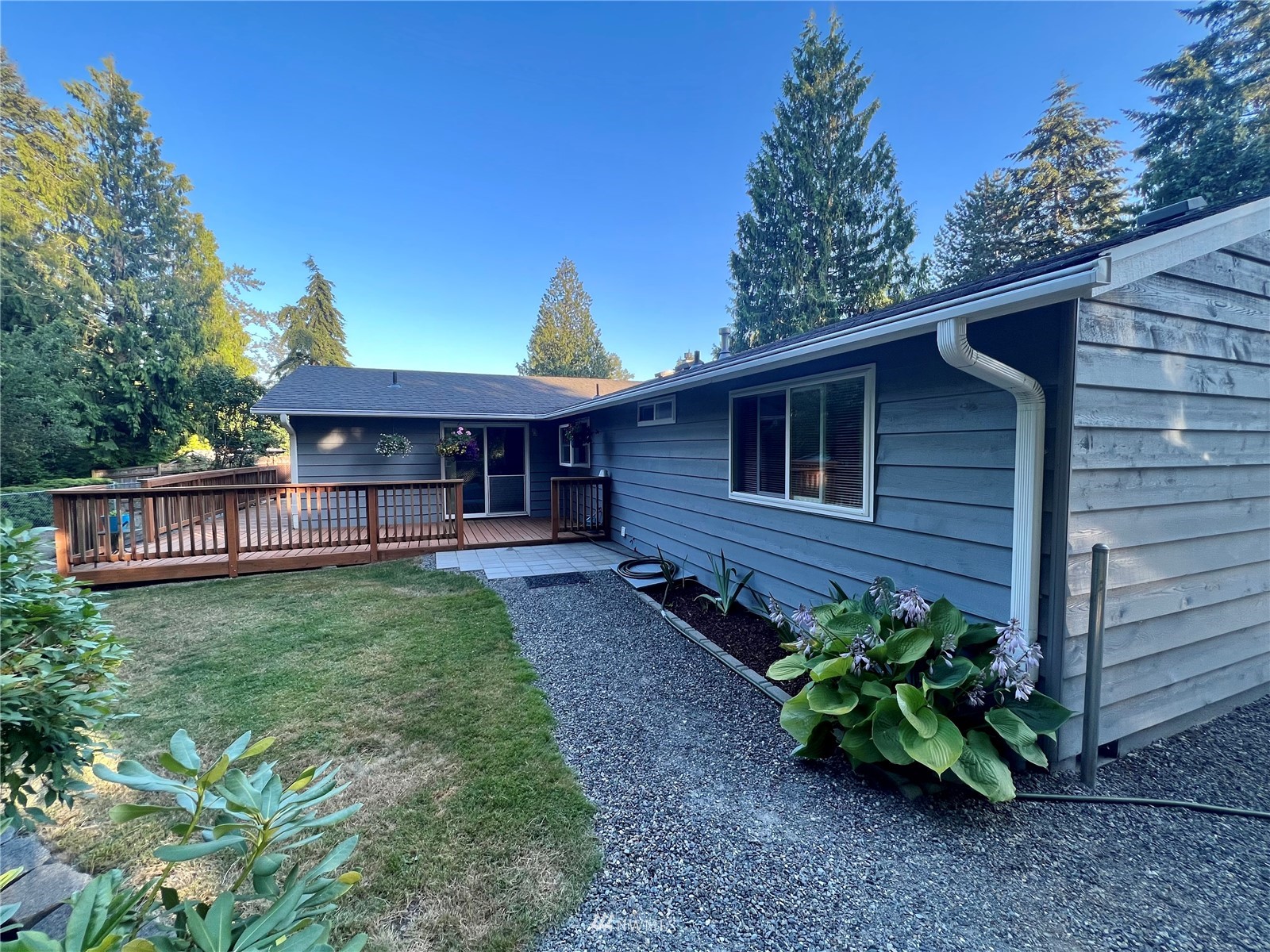 7407 Vandermark Road East Bonney Lake, WA 98391 - Photo 30 of 30 a view of a house with garden and yard
