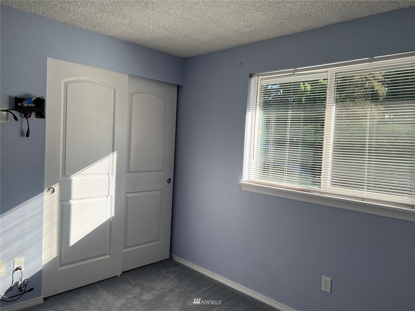 7407 Vandermark Road East Bonney Lake, WA 98391 - Photo 7 of 30 an empty room with windows