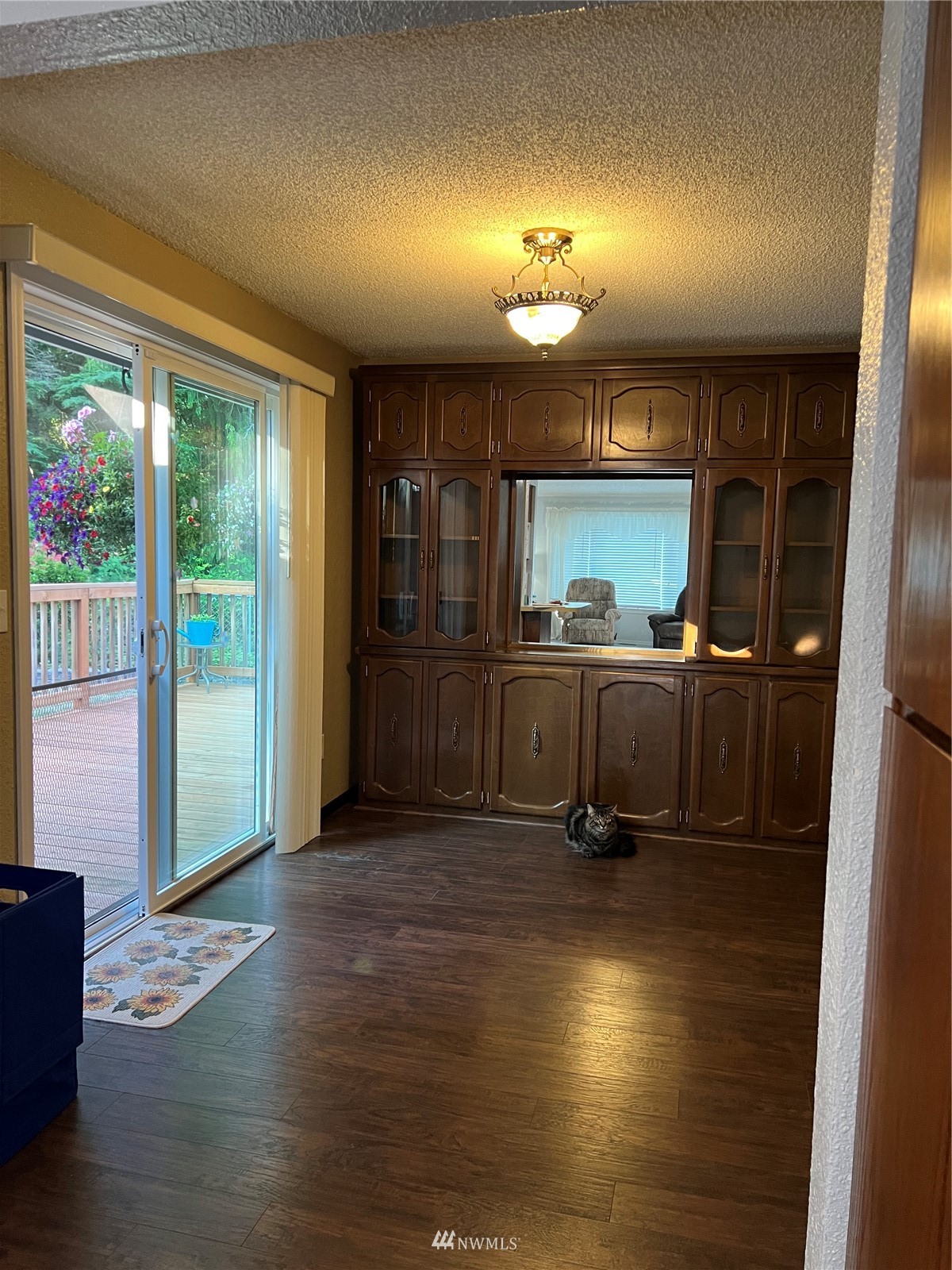 7407 Vandermark Road East Bonney Lake, WA 98391 - Photo 10 of 30 a room with wooden floor and a window