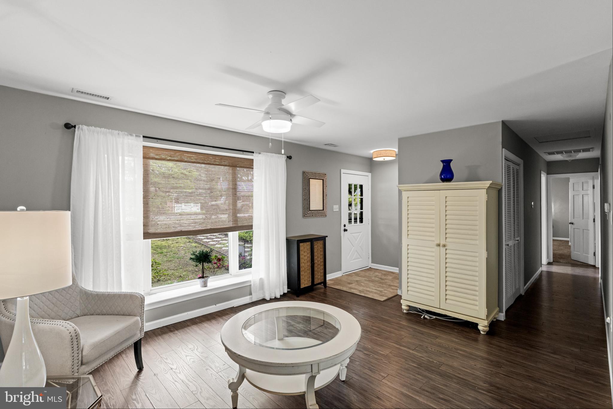 28 Windmill Clementon, NJ 08021 - Photo 5 of 28 a living room with furniture and a fireplace