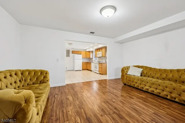a view of livingroom with furniture and wooden floor