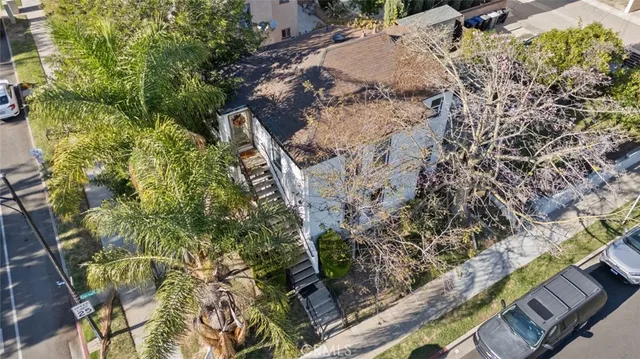 a park with trees and a yard