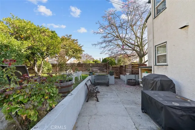 a view of a chairs setting in the backyard