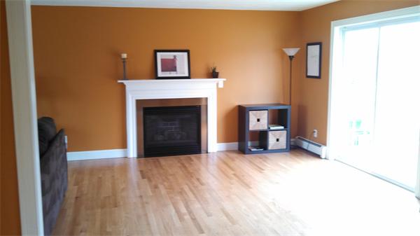 9 Vista Circle Rutland, MA 01543 - Photo 13 of 24 a view of an empty room with a fireplace