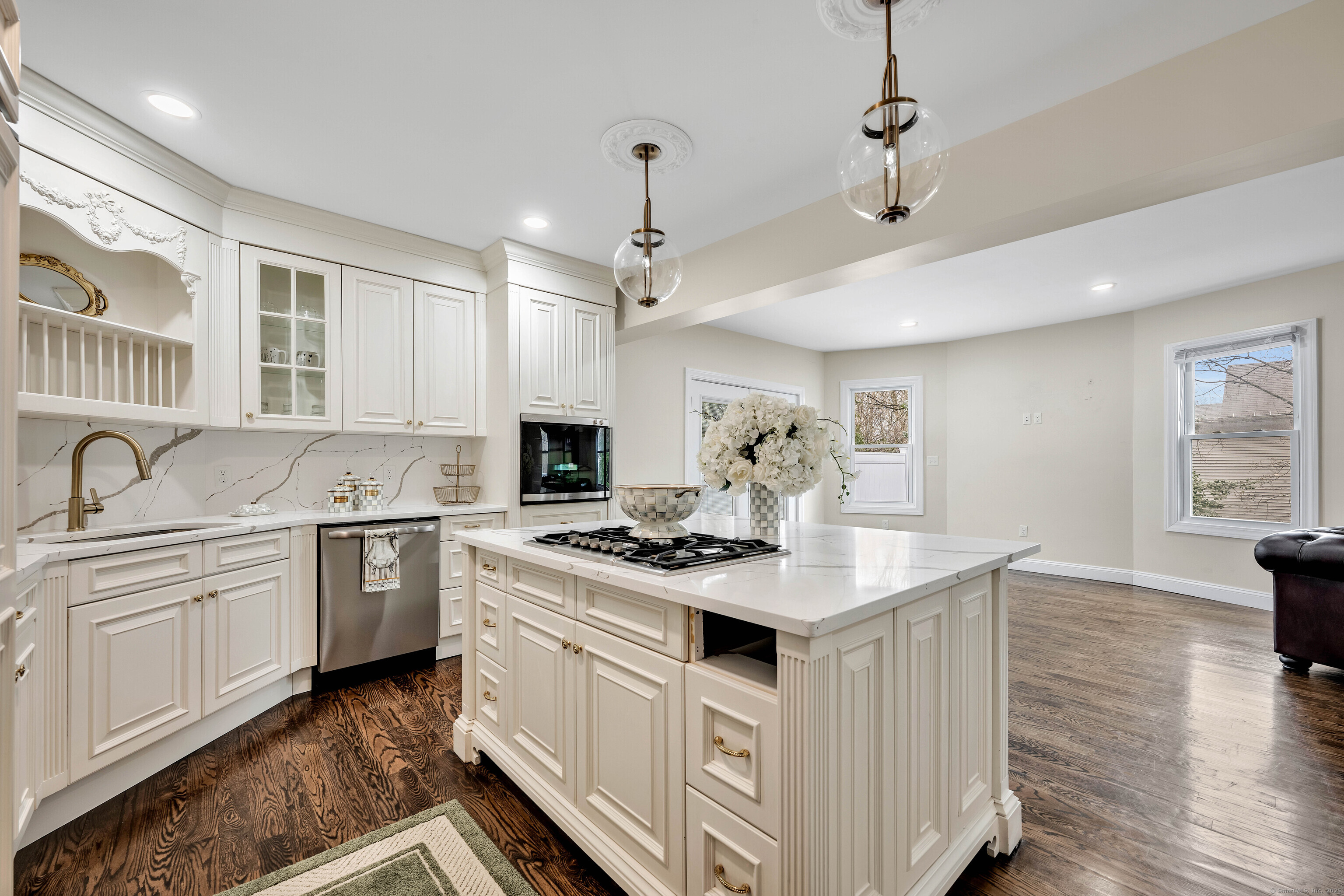 550 New Hanover Avenue Meriden, CT 06451 - Photo 4 of 34 a kitchen with stainless steel appliances granite countertop a sink stove and refrigerator