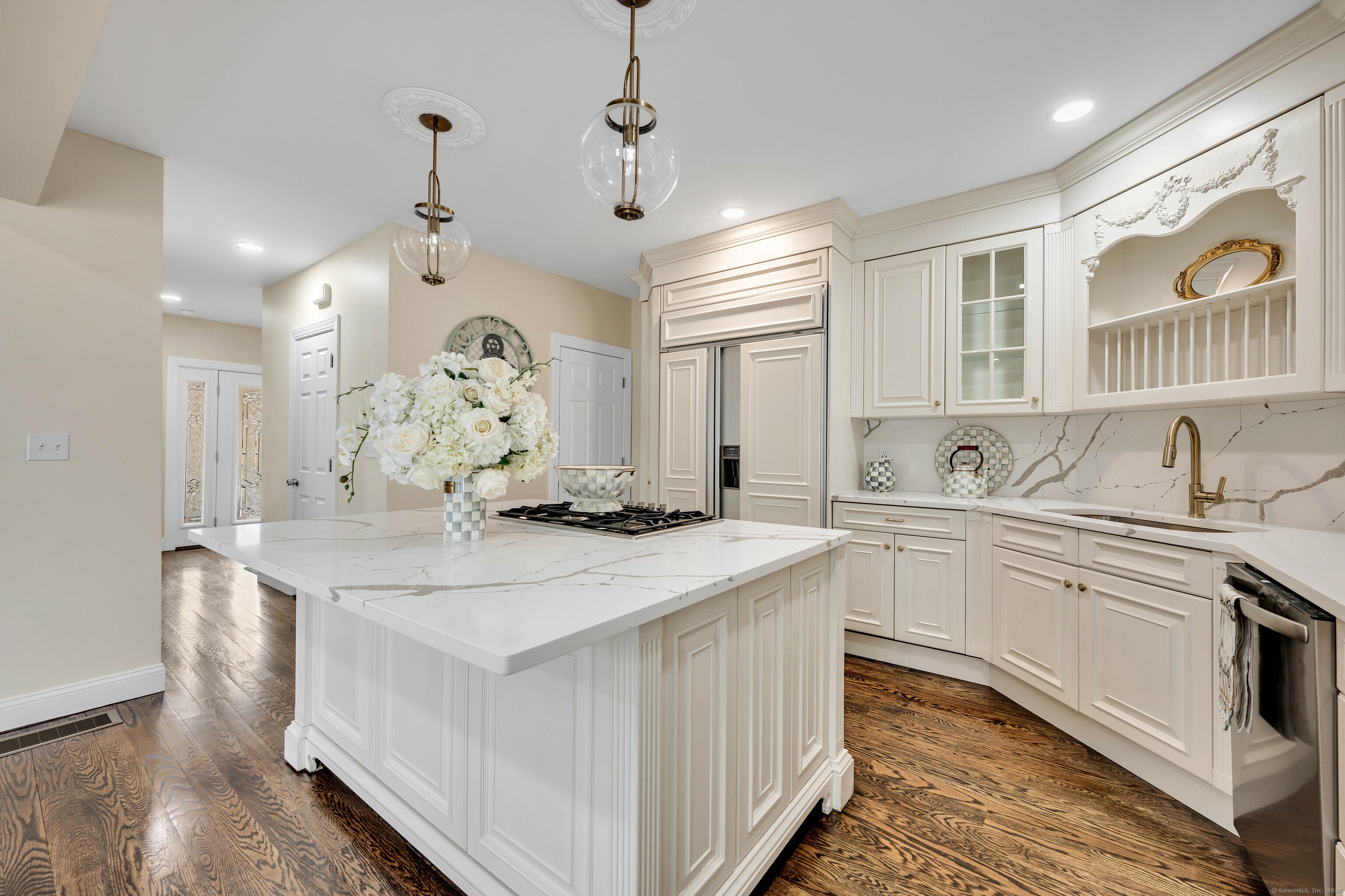 550 New Hanover Avenue Meriden, CT 06451 - Photo 5 of 34 a kitchen with white cabinets appliances and a sink