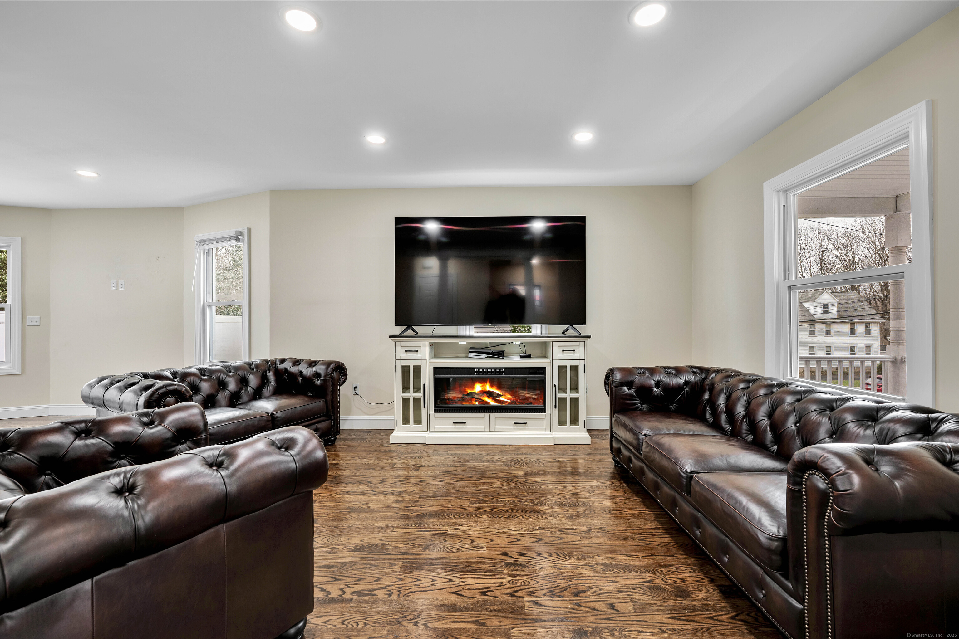 550 New Hanover Avenue Meriden, CT 06451 - Photo 9 of 34 a living room with furniture and a flat screen tv