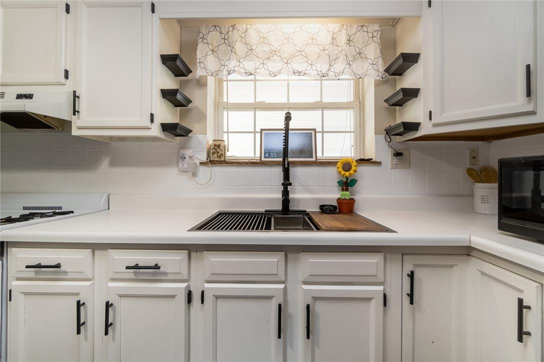 331 East Lizard Creek Road Lehighton, PA 18235 - Photo 22 of 37 White kitchen cabinetry and countertops create a bright, inviting space.