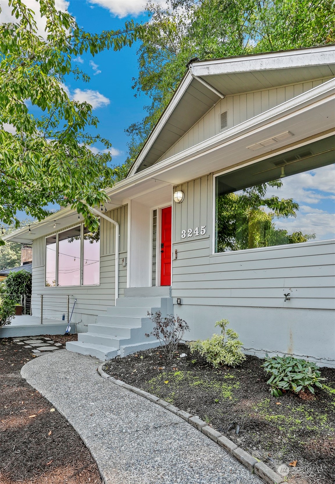 3245 Northwest Esplanade Seattle, WA 98117 - Photo 11 of 38 a front view of a house with garden