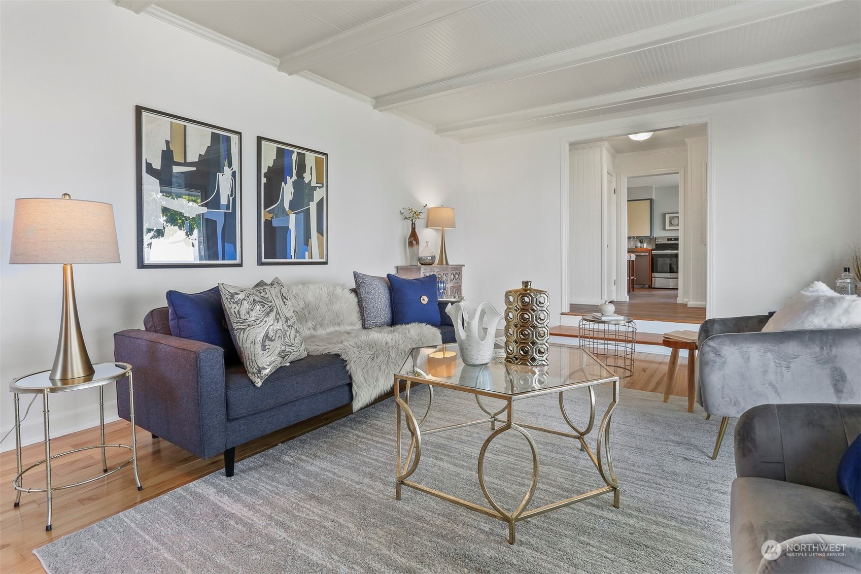 3245 Northwest Esplanade Seattle, WA 98117 - Photo 15 of 38 a living room with furniture and a wooden floor