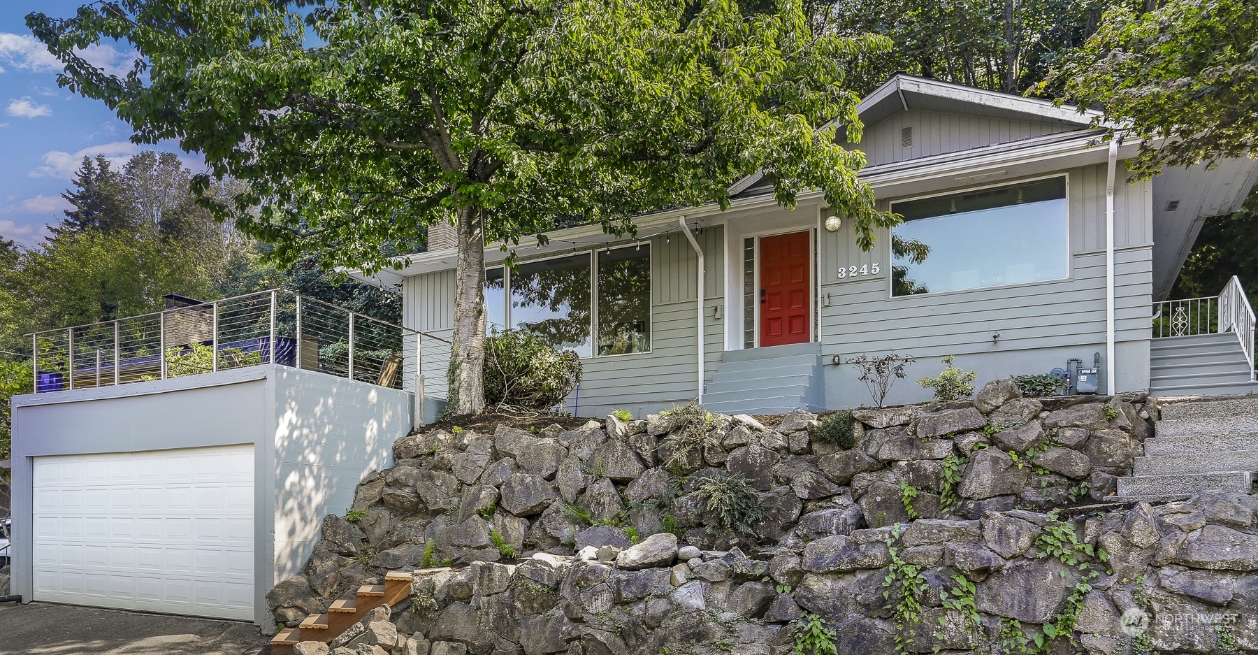 3245 Northwest Esplanade Seattle, WA 98117 - Photo 2 of 38 front view of a house with a tree