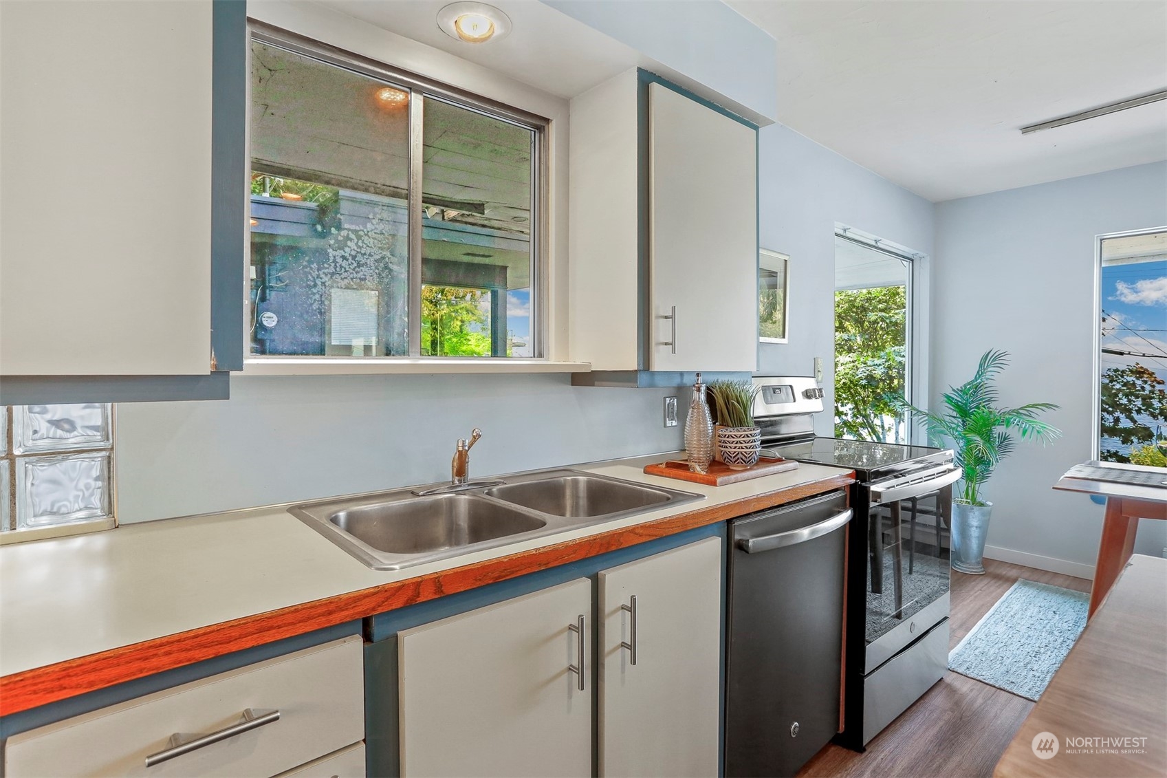 3245 Northwest Esplanade Seattle, WA 98117 - Photo 25 of 38 a kitchen with a sink and cabinets