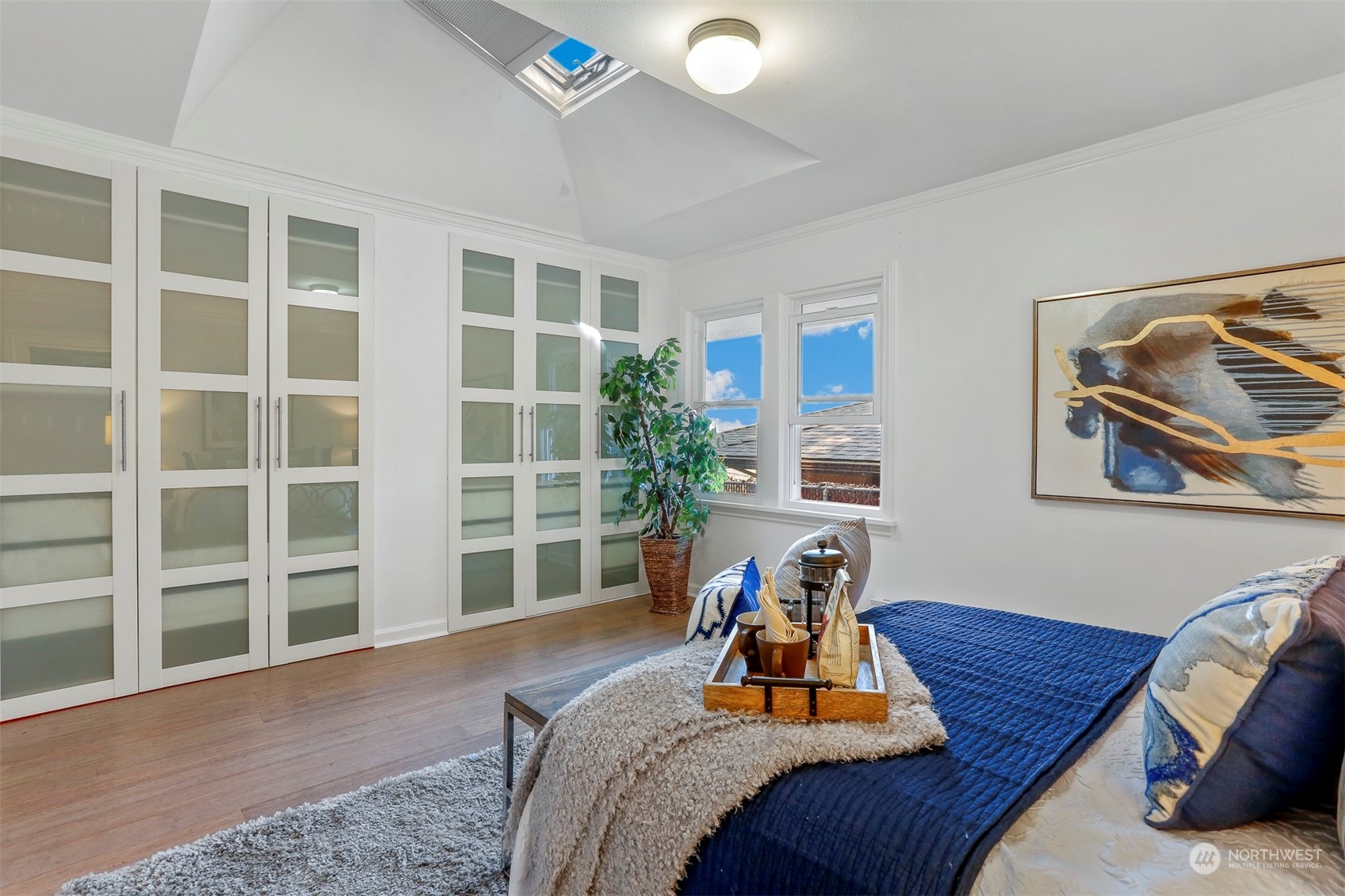 3245 Northwest Esplanade Seattle, WA 98117 - Photo 29 of 38 a bed sitting in a bedroom next to a window
