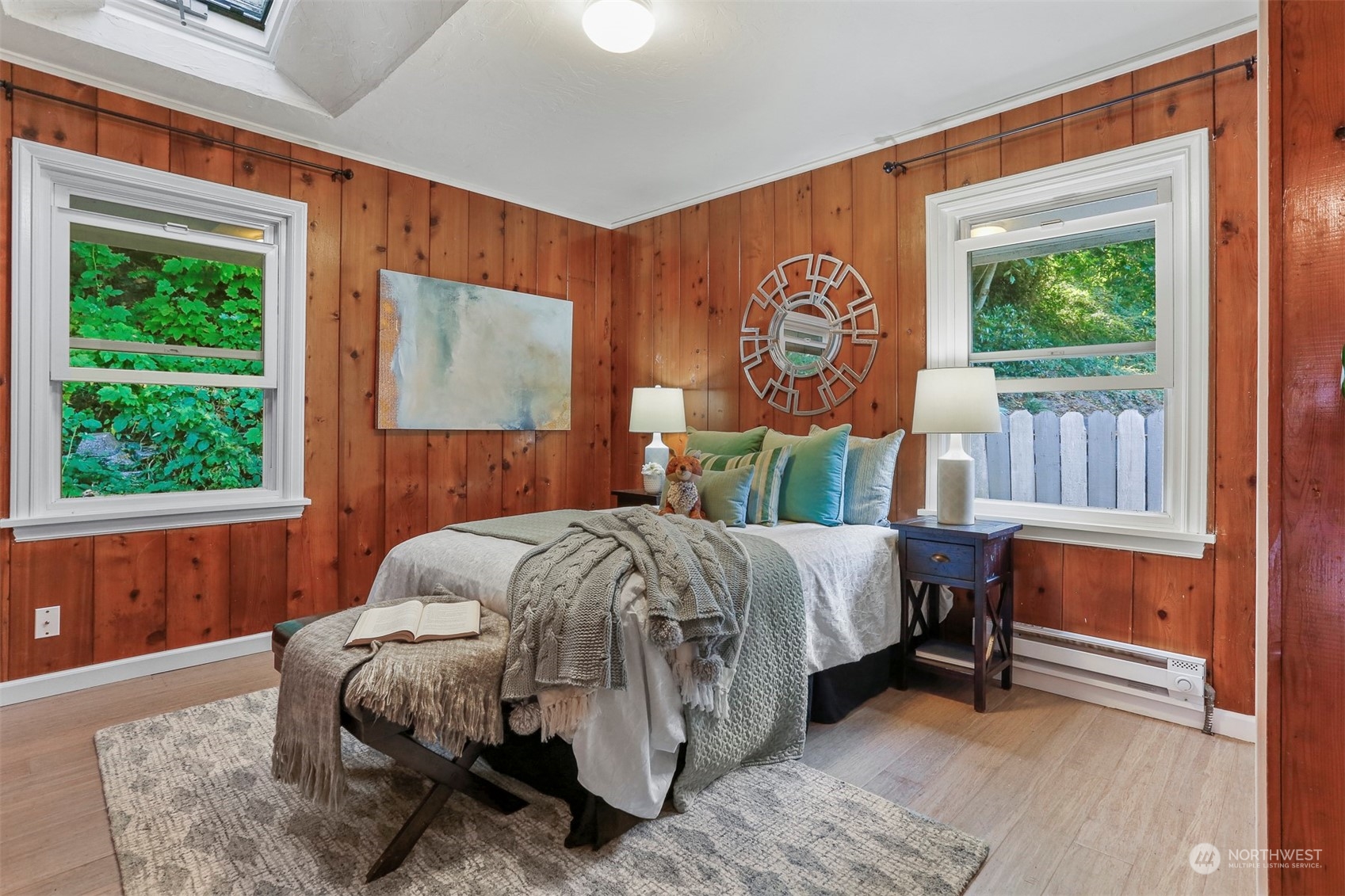 3245 Northwest Esplanade Seattle, WA 98117 - Photo 32 of 38 a bed sitting in a bedroom next to a window