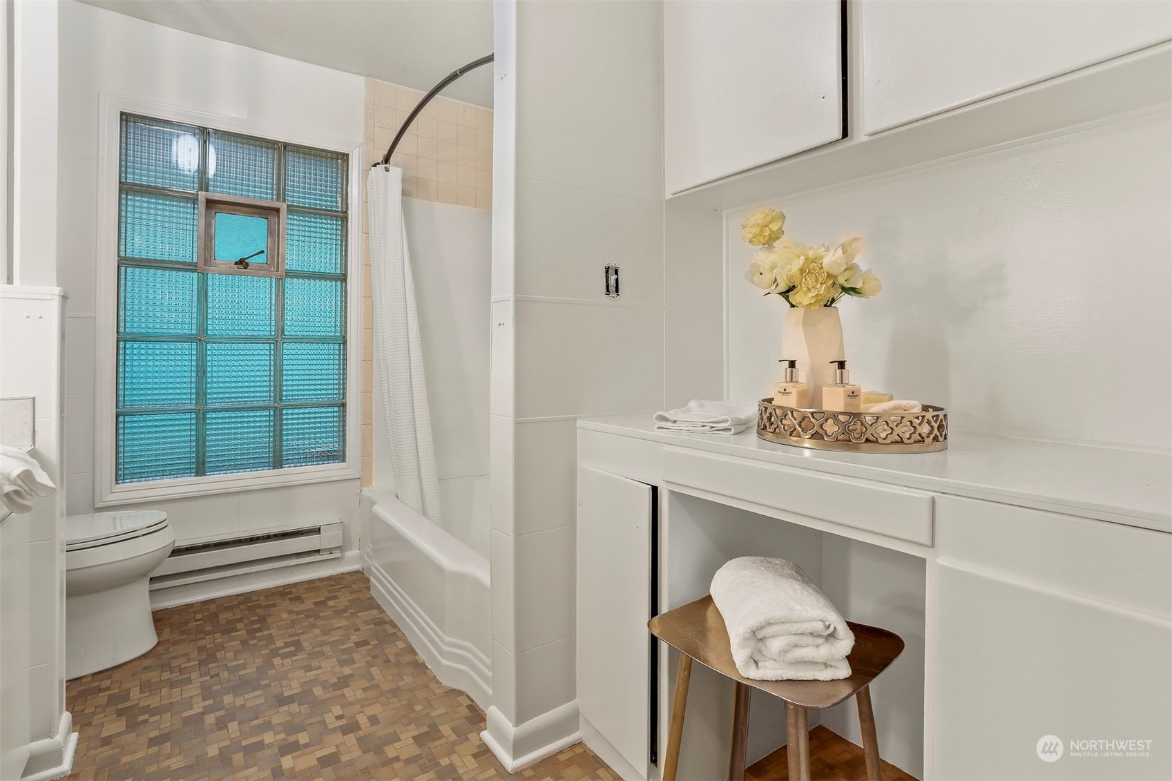 3245 Northwest Esplanade Seattle, WA 98117 - Photo 33 of 38 a bathroom with a sink and a toilet